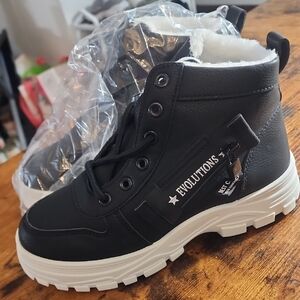 Evolution's Men Or Women Black and White Boots Size Women 7-7.5 And Men Size 6.